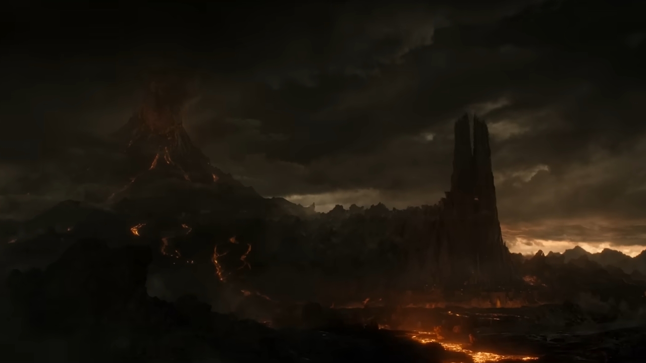 Mordor sa Barad-durom i vatrenim obroncima pod tamnim nebom.